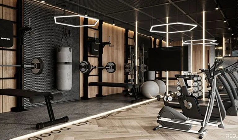 Modern fully equipped gymnasium at residential complex